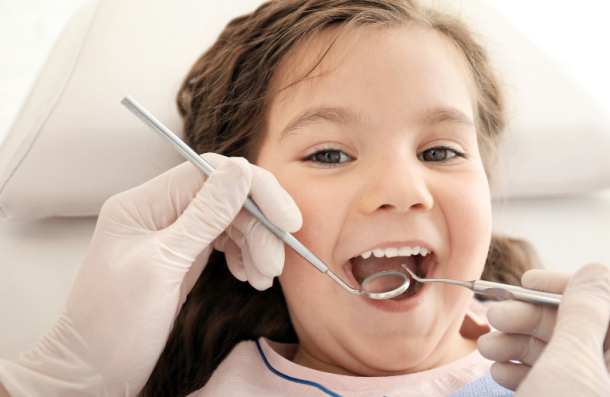 Children's Dentistry girl at dentist