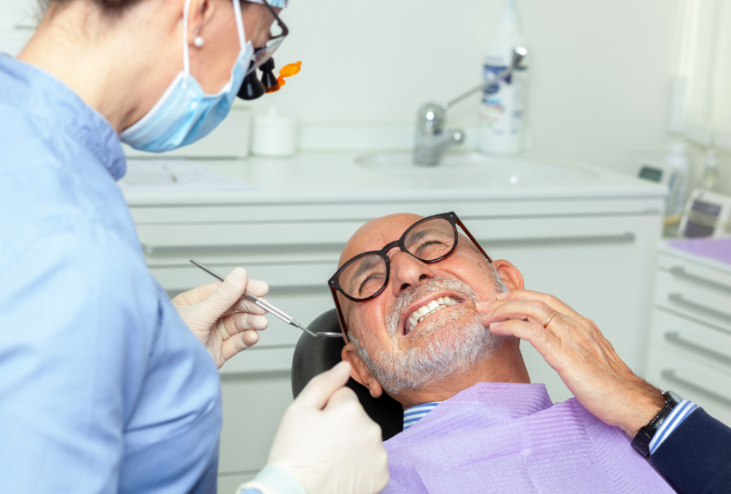 man at dentist having check up