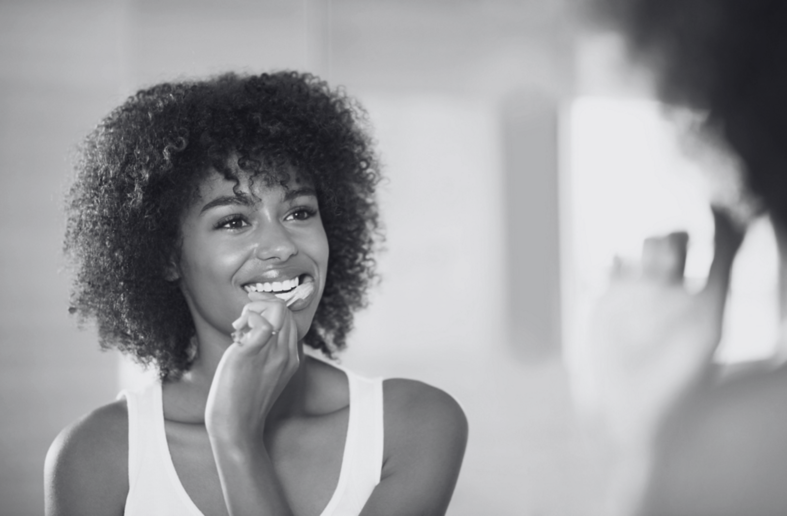 Modbury home lady brushing teeth