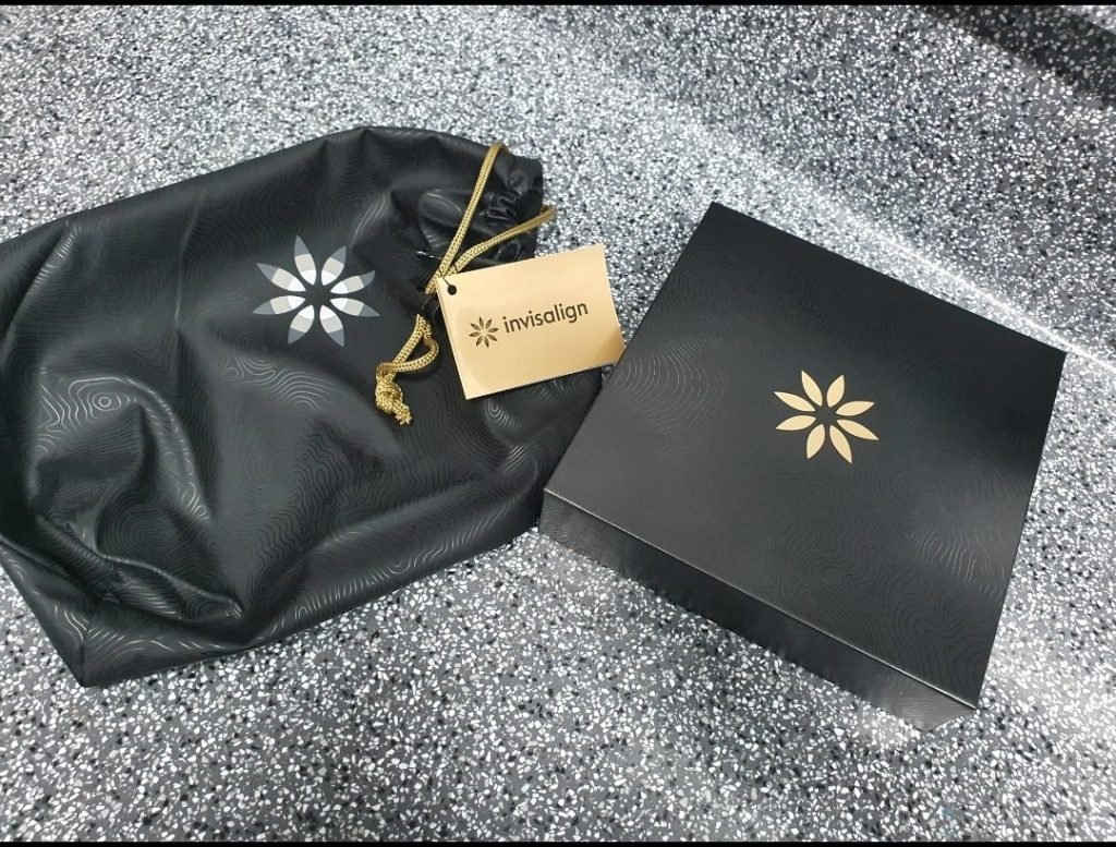 Invisalign boxes and bag